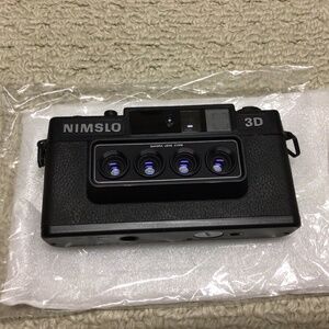 Nimslo 3D Camera With Flash. Working condition unknown.